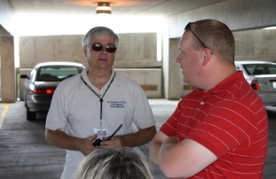 Keith Butler KC9IWL La Crosse County Emergency Manager talks with MVARA member Cory KC9NOJ