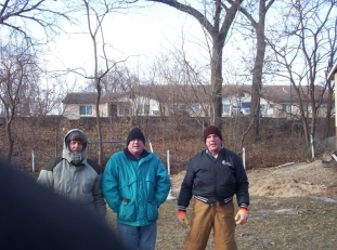 Eric WX9EP, Oscar K9WKW and Terry KB9YXV try to stay warm, The wind was a blowin.