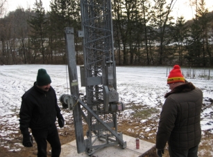 Tom and Oscar inspect the upright tower.