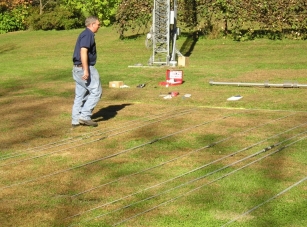 The antenna elements are sorted and laid out for assembly 